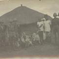 Canadian soldiers by native hut, Africa, WWI, Pte. Harold Dean Collection, B.E.F.