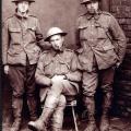 Sergt. J.A. Lindsay (seated) with two others from his battery.