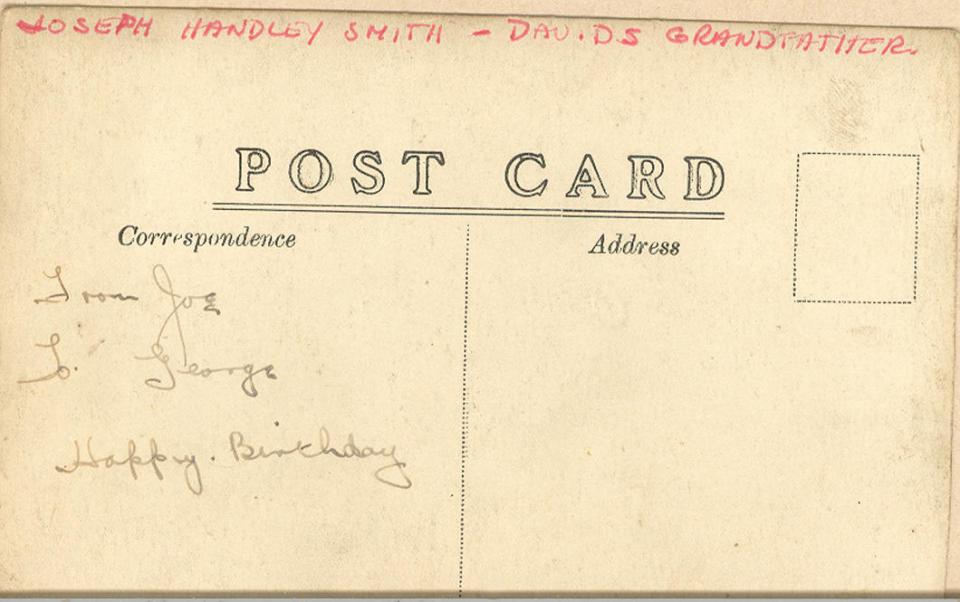 Back of post card featuring Joseph Handley Smith with unidentified males.