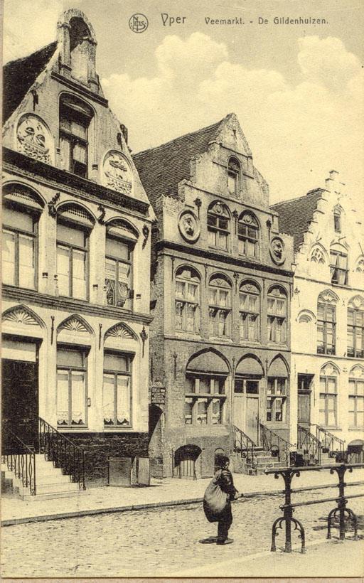 Undated postcard featuring a soldier in front of 
"Yperen Gildenhuizen op de Veemarkt"(Yperen Guild Houses on the Veemarkt)in Belgium.