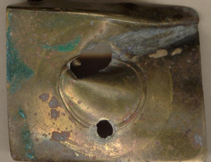Herbert Cuncliffe's belt buckle with bullet hole.