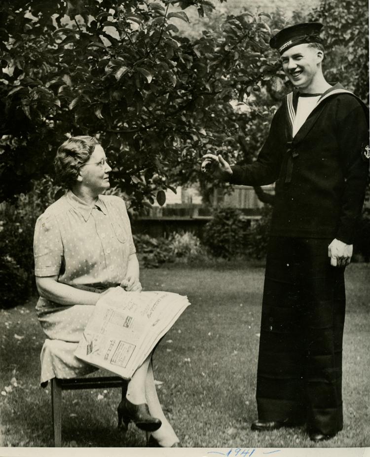 Hampton Gray standing beside his mother Wilhelmina Gray; 1941