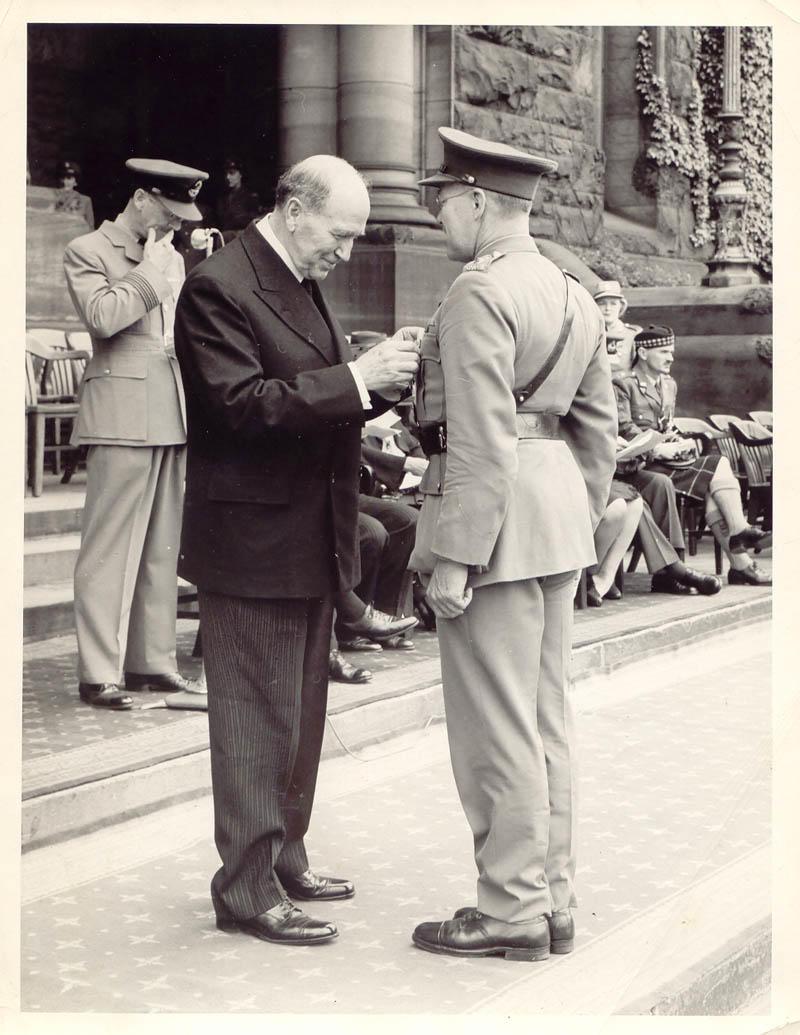 Lieutenant Colonel James W. Ross receiving his O.B.E.