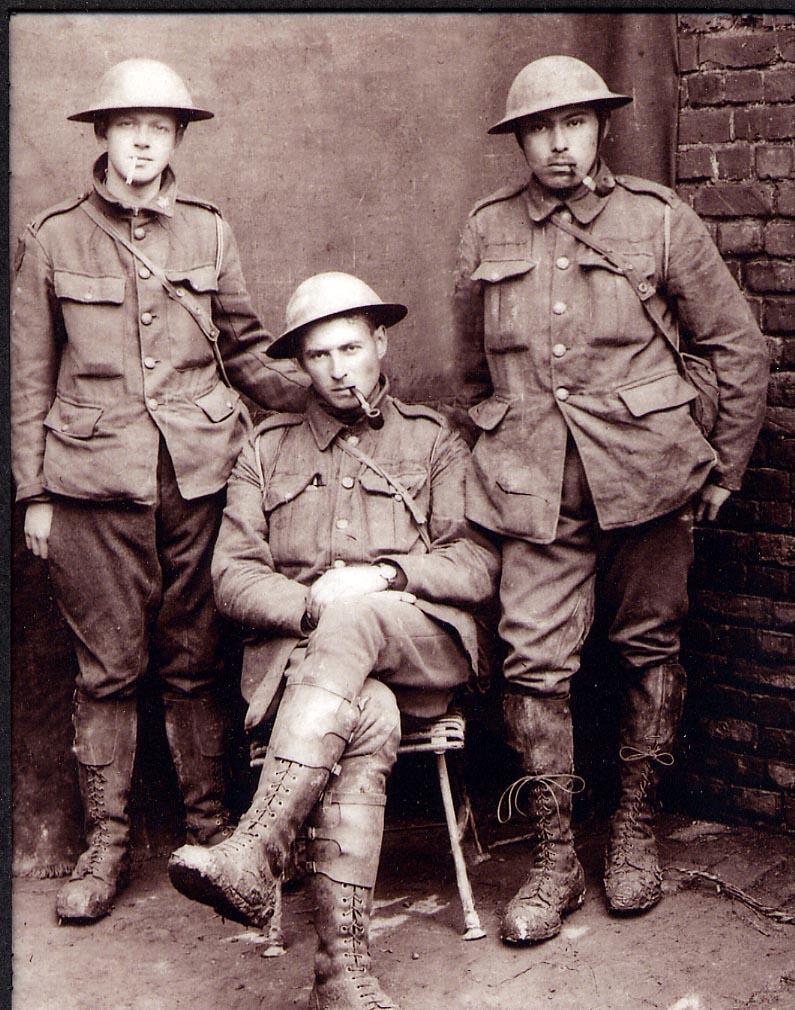 Sergt. J.A. Lindsay (seated) with two others from his battery.